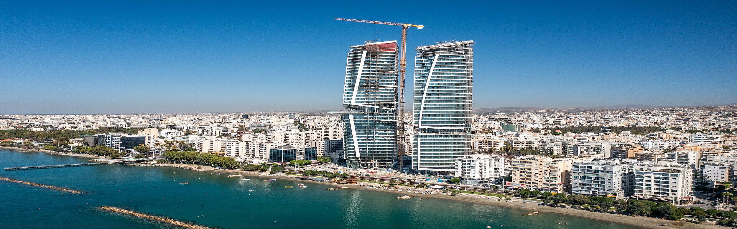 Mixed-use tower trio on the beach in Limassol.